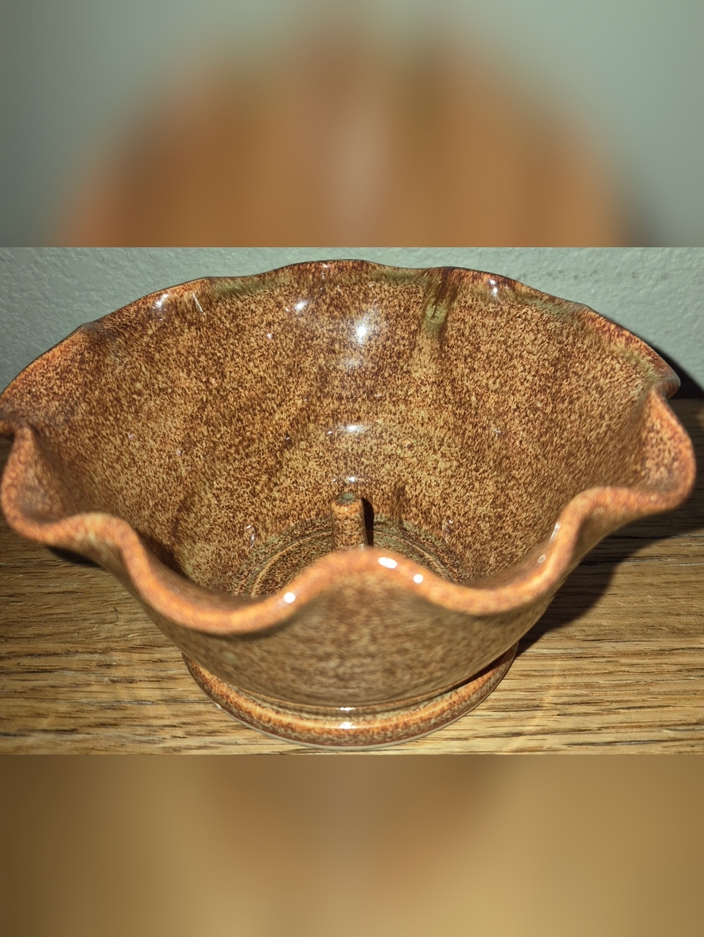 Full Moon Pottery bowl by artisan J. Ray with a speckled brown glaze